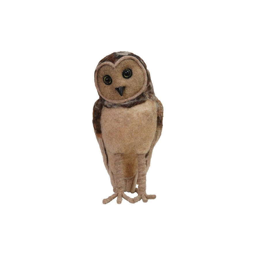 The CREATIVE COOP HANDMADE FELT BARN OWL features brown and tan plush felt, large black eyes, and a tilted head, making it a charming decorative accent.