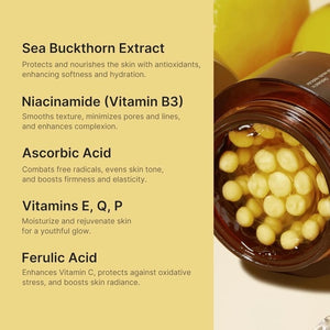 Open jar of MEDICUBE - DEEP VITA C CAPSULE CREAM, 55G by KOSMIC KBEAUTY SKINCARE on right, showing its yellow capsule cream. On the left, ingredient list highlights: Sea Buckthorn Extract, Niacinamide to help brighten skin and address uneven tone, Ascorbic Acid, Vitamins E, Q & P, and Ferulic Acid—all with skin benefits. Set against a warm yellow background.