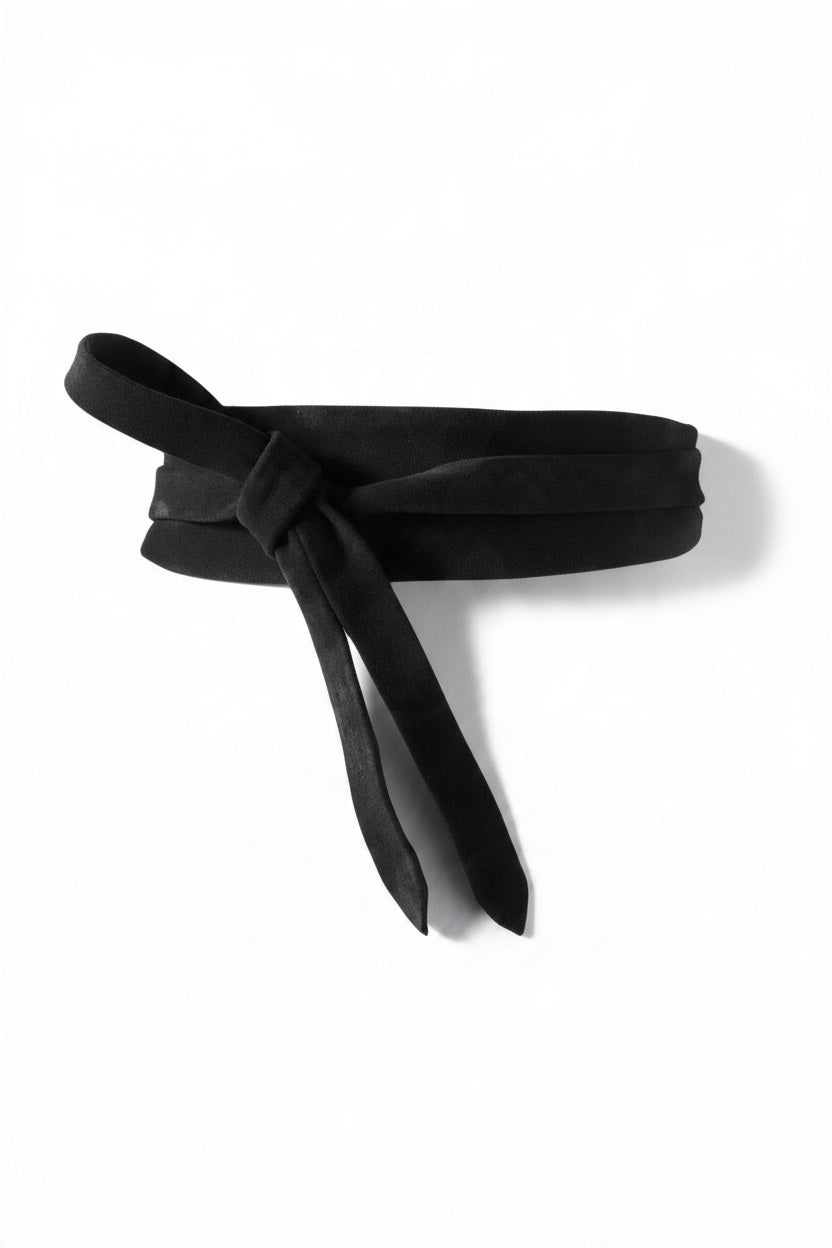ADA - SUEDE LEATHER WRAP BELT IN BLACK featuring a black suede design with a front knot, crafted as a versatile one-size belt.