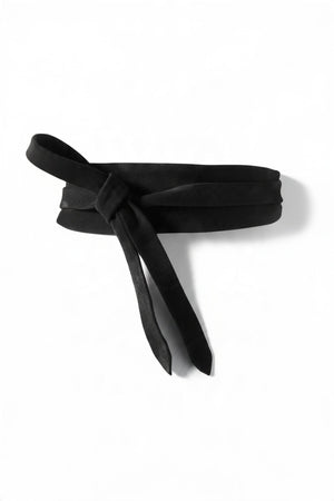 ADA - SUEDE LEATHER WRAP BELT IN BLACK featuring a black suede design with a front knot, crafted as a versatile one-size belt.