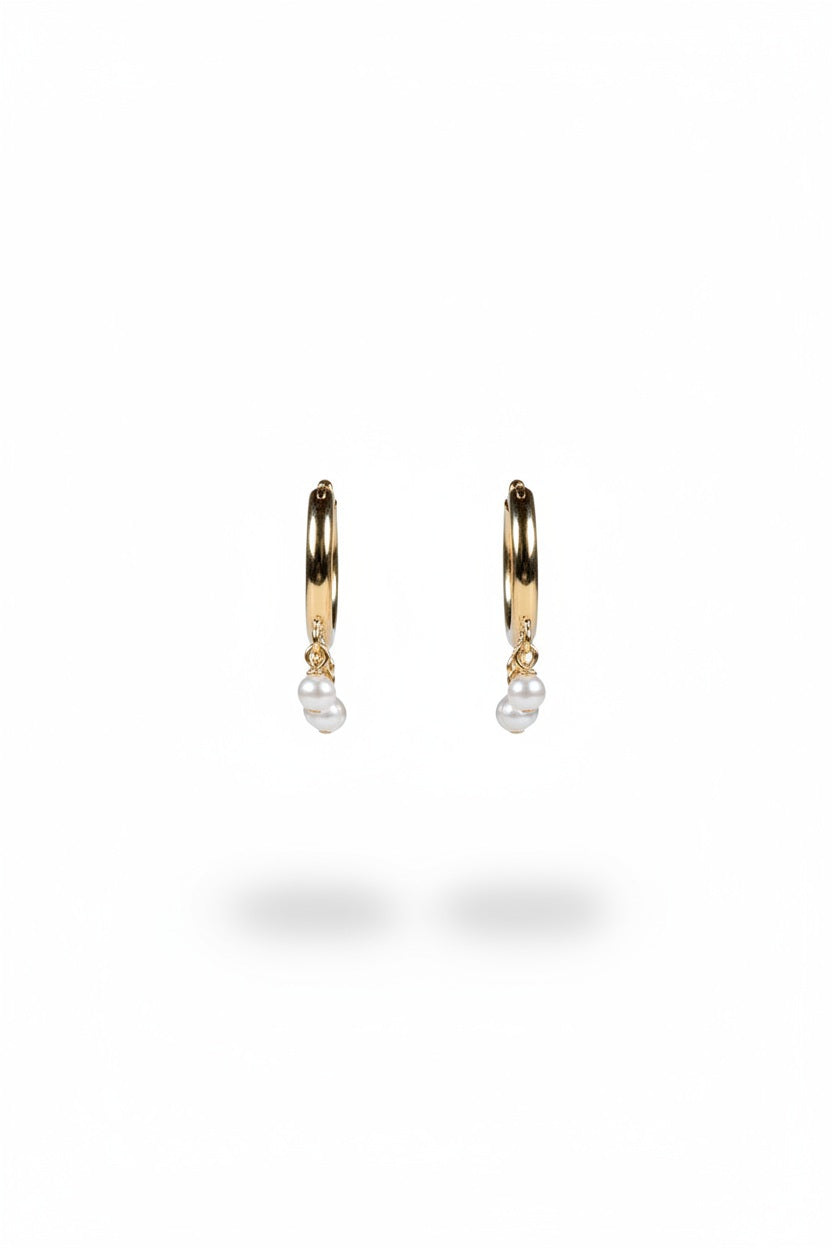 GOLDISH - FRINGE HOOP EARRINGS WITH WHITE PEARLS by GOLDISH: small gold fill hoops featuring three dangling white pearl charms, shown on a plain white background.