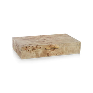 The ZODAX BURL WOOD VENEER BOX - LARGE is a rectangular, light brown box with a glossy marbled finish and a slim gold front handle, shown against a white background.