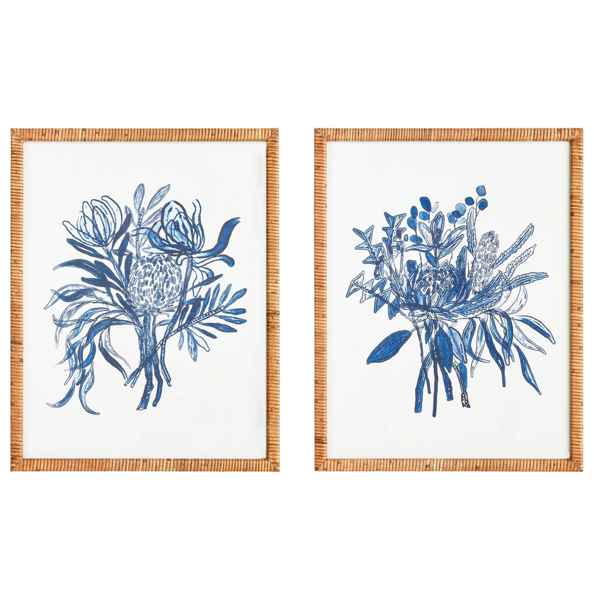 The NAPA HOME AND GARDEN - BANKSIA BOUQUET PRINT offers two framed artworks with blue botanical illustrations and rattan-wrapped frames; one features abstract florals, and the other showcases monochromatic bouquets in soothing tones, perfect for in-store pickup to enhance your decor.