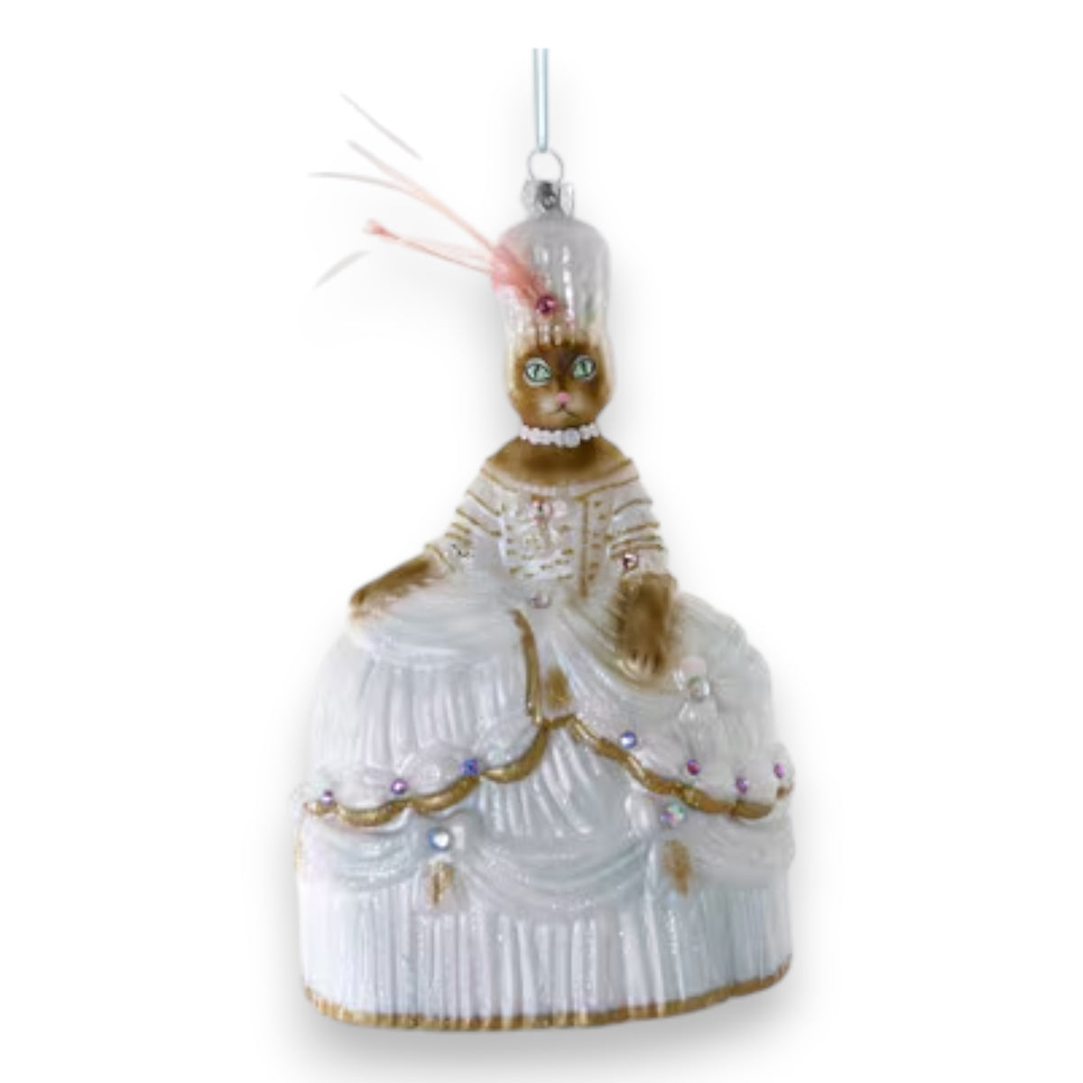 The MARIE CATOINETTE ORNAMENT by CODY FOSTER features a cat in an ornate white and gold 18th-century gown with pearls and feathers, hanging from a silver string—a delightful gift for collectors or design lovers.