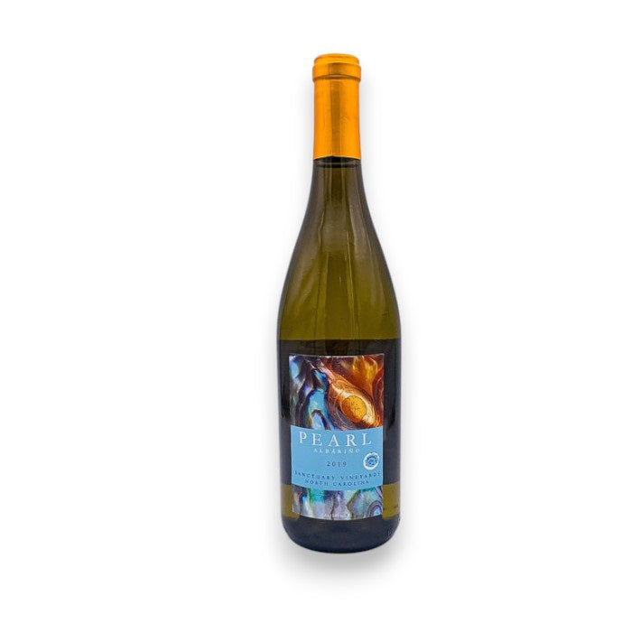 A bottle of SANCTUARY 'PEARL' ALBARINO 2024 by WINE: FREEDOM BEVERAGE, featuring a golden-yellow foil top and a blue label with artistic imagery, is displayed on a plain white background.