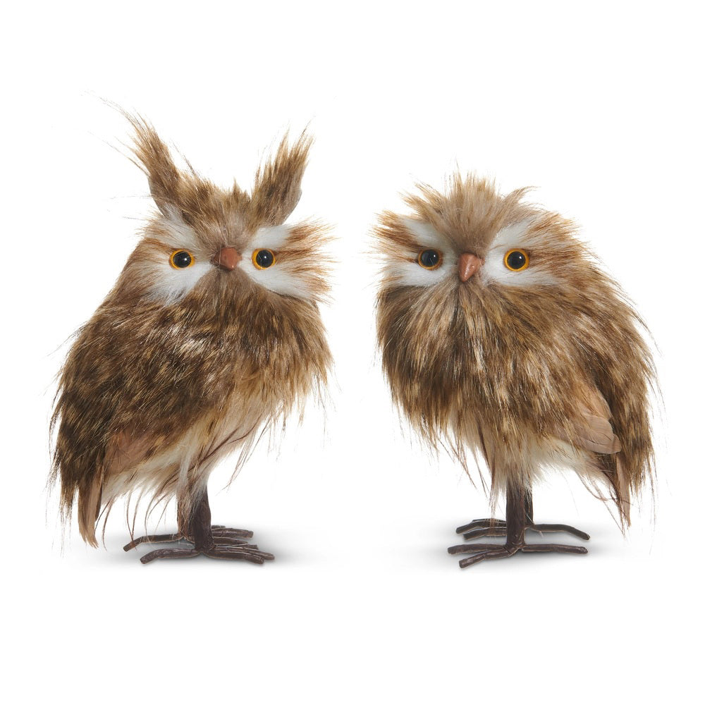 Two fluffy OWL ORNAMENTS by RAZ IMPORTS, with brown and white polyester feathers and large eyes, stand side by side against a white background. Each is sold individually.