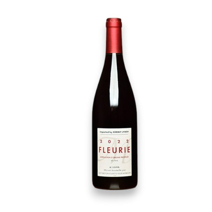 A bottle of 2023 GUY BRETON FLEURIE BEAUJOLAIS red wine from WINE: TRYON, with a red cap and a white label with red and black text, set against a plain white background.