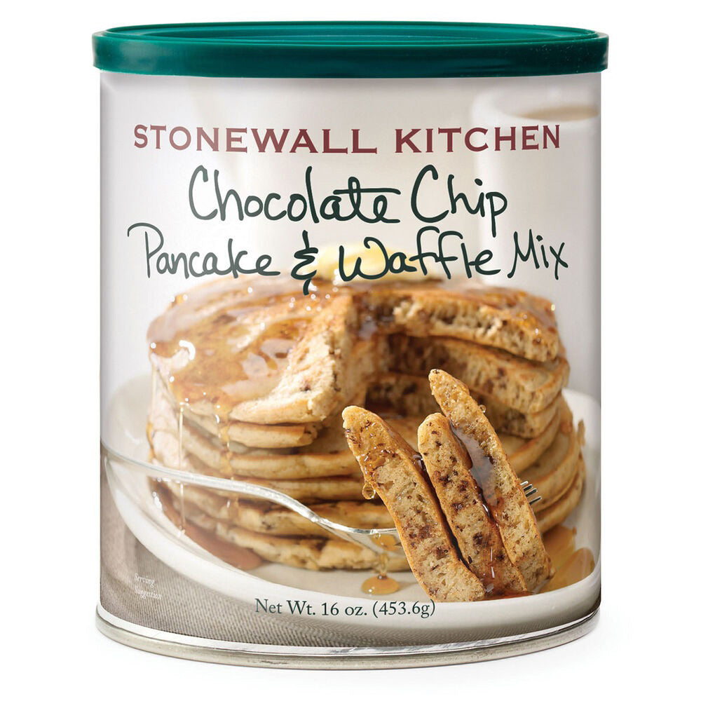 A cylindrical container of STONEWALL KITCHEN - CHOCOLATE CHIP PANCAKE AND WAFFLE MIX is pictured. The label displays an image of stacked decadent pancakes topped with syrup, with a fork cutting into them. Perfect for breakfast or dessert, the container weighs 16 oz (453.6g).