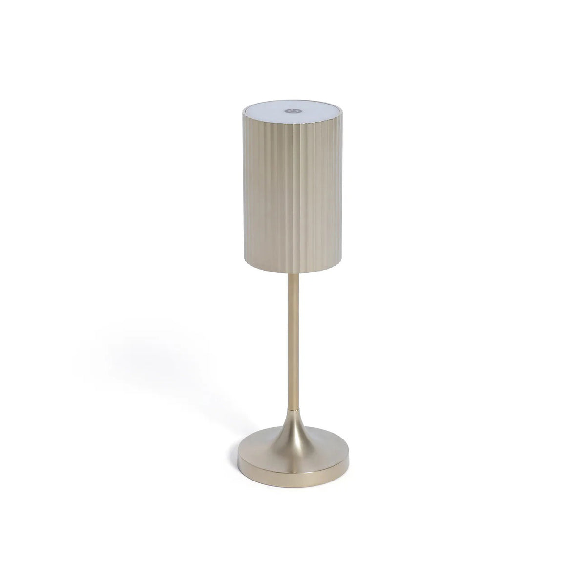 The ZODAX REED RECHARGEABLE LAMP is a modern, gold-colored table lamp with a cylindrical, vertically ribbed shade and a sleek, straight stem on a round base. It features adjustable light intensity and is shown against a white background.