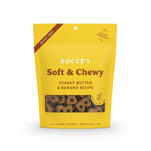 Yellow bag of BOCCE’S BAKERY - PB AND BANANA SOFT AND CHEWY TREATS with a clear window showing bone-shaped treats baked in the USA.