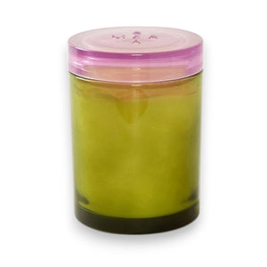 The MERSEA - SUMMER IN PROVENCE JOLIE JAR CANDLE by MERSEA features a green glass jar with a translucent pink lid, shown on a white background. Its smooth, cylindrical design makes it ideal for holding summer-inspired scents.