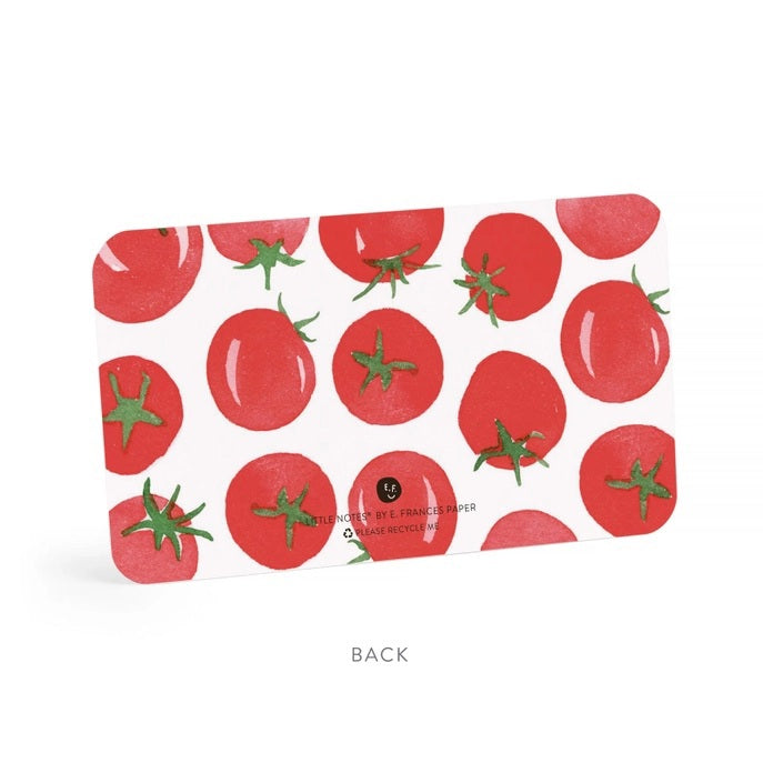 The E. FRANCES - LITTLE NOTES TOMATO by E. FRANCES PAPER is a white mini note card with rounded corners, decorated with illustrated red tomatoes and green stems along the top edge—ideal for gardening stationery fans.