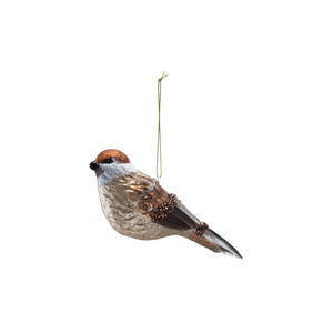 The CREATIVE COOP MERCURY GLASS BIRD ORNAMENT features brown and gray coloring, glitter bead accents, and a gold hanging string, shown isolated on a white background.