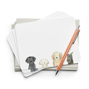 E. FRANCES PAPER - FLAT NOTES DOG DAYS includes 8 notecards and envelopes, each featuring illustrations of four distinct dog breeds with vibrant colors. The set is packaged in a light green box with a transparent lid, highlighting the charming contents.