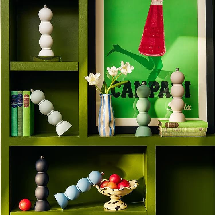 The ADDISON ROSS LONDON Scandi Bobbin Salt or Pepper Mill (23 cm) features a modern matte pastel green finish, a unique stacked spherical design with three round sections, ceramic grinder, and a small metal knob on top.