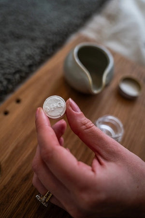 A set of MADISON GREEN - REST YOUR EYES ON THE BED relaxing eye masks and a small jar, all packaged in minimalist white with light brown text, displayed against a plain white background.