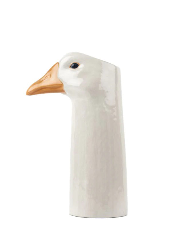 The QUAIL CERAMICS – GOOSE FLOWER VASE by QUAIL DESIGNS is a hand painted stoneware vase shaped like a goose’s head and neck, featuring a white body, orange beak, and black eye, displayed upright on a plain white background.