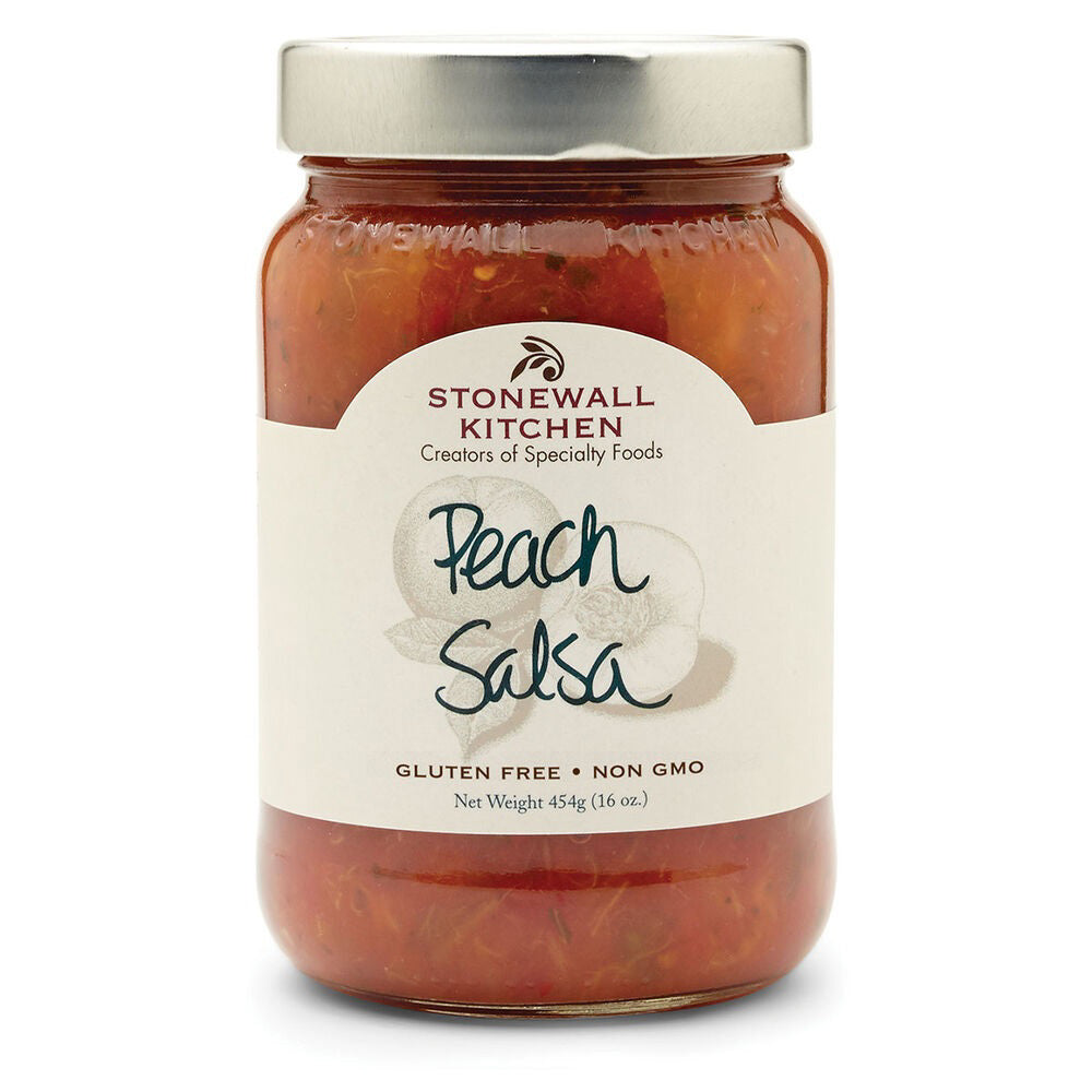 A jar of STONEWALL KITCHEN- PEACH SALSA with a silver lid is ready to enhance your favorite dishes. The label proudly states it is gluten-free and non-GMO. Ideal for pairing with grilled chicken or cream cheese, each jar weighs 454g (16 oz).