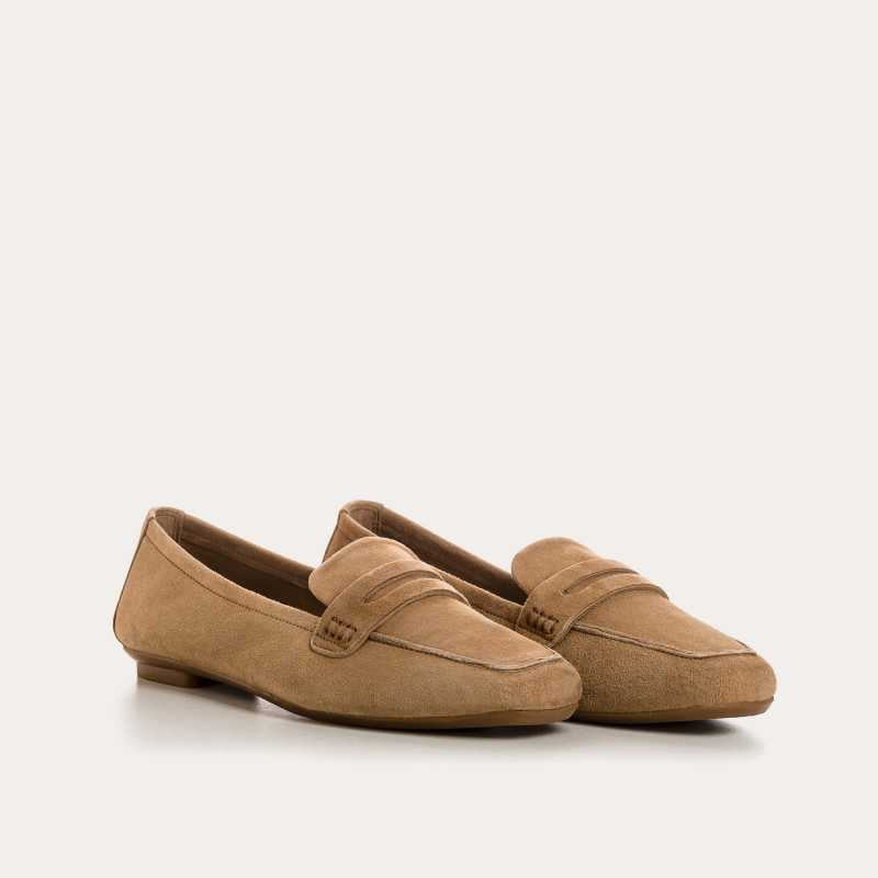 Top view of the REQINS - HEMA suede loafer in natural, featuring stitching details and a subtle branded leather insole, highlighting REQINS' craftsmanship against a plain white background.