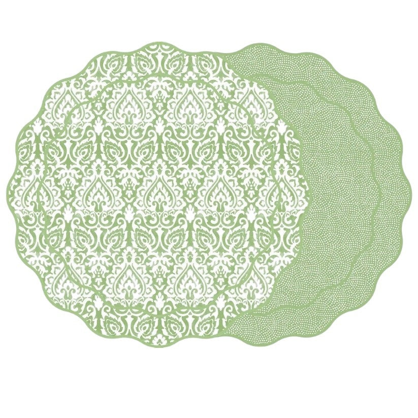 Two handcrafted HOLLY STUART DESIGNS DAMASK SCALLOP PLACEMATS in Saxon Green overlap; one features a green and white damask pattern, the other a subtle dotted design. Both are reversible with decorative scalloped edges.