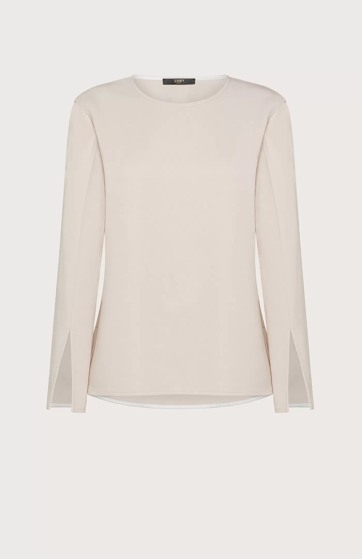 The SEVENTY Stretch Crewneck Viscose Top with Sleeve Detail is a light beige, long-sleeve shirt featuring a simple and elegant design. Made in Italy, this sophisticated top has slightly flared sleeves with subtle slits near the cuffs and a relaxed fit. Crafted from stretch viscose cady, it hangs straight for a minimalistic and refined appearance.