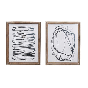The WOOD FRAMED ABSTRACT LINE ART by CREATIVE COOP features two minimalist prints: one with stacked wavy black lines, the other with looping swirls forming an irregular oval, both on white backgrounds in wooden frames.
