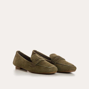 REQINS - HEMA suede loafers in olive feature a classic silhouette, flat sole, decorative upper strap, and comfortable leather insole, shown in side profile against a plain light background.