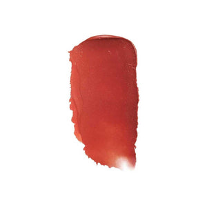 A single swatch of MINORI - CREAM BLUSH in Scarlet sweeps across a white background, revealing its creamy texture and rich pigment—capturing the effortless glow of a natural-looking blush from MINORI.