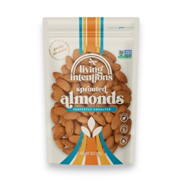 A resealable white and blue bag labeled “LIVING INTENTIONS - SPROUTED ALMONDS UNSALTED” from the brand LIVING INTENTIONS, featuring an image of sprouted almonds. The packaging displays several certifications, such as Non-GMO Project Verified and Paleo friendly. Net weight: 6 oz (170g).