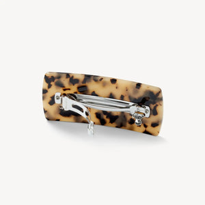 The MACHETE - Jumbo Box Barrette in Blonde Tortoise features a rectangular Italian acetate design with a beige and black tortoiseshell pattern, showcased against a plain white background.