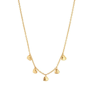 The CAPUCINE DE WULF - LOVE HEART MULTI STATION necklace by CAPUCINE DE WULF is a delicate piece handcrafted with 18K gold plating, featuring five small, textured heart-shaped charms evenly spaced along the front for a timeless and elegant look.