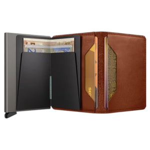 A slim, rectangular SECRID Slimwallet Texano in Saddle stands vertically, featuring a metallic finish with wooden sides. The brand name “SECRID” is printed in white near the top, exemplifying a blend of style and RFID protection for your essentials.