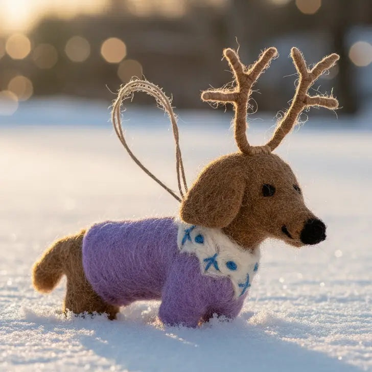 RUDY DACHSUND ORNAMENT, a handmade needle felt dachshund wearing a lavender sweater and reindeer antlers.