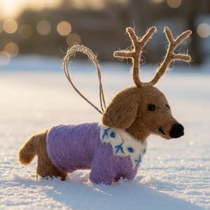 RUDY DACHSUND ORNAMENT, a handmade needle felt dachshund wearing a lavender sweater and reindeer antlers.