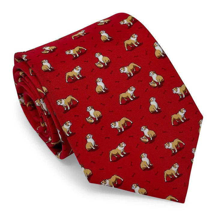 The BIRD DOG BAY - Bulldog Bonanza Silk Tie in Red features a playful repeating pattern of illustrated brown and white bulldogs, making it the perfect unique accessory for dog lovers.