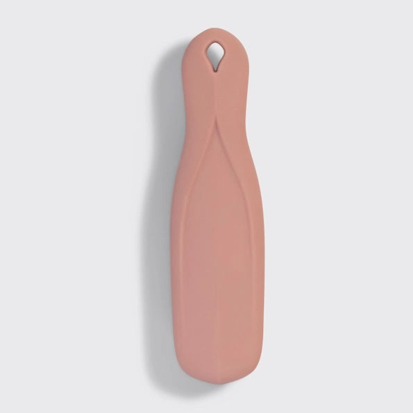 A KITSCH - Scalp Renewal Brush in Terracotta is displayed beside its box packaging, which features the product name and emphasizes its gentle, soothing scalp massage benefits as well as its eco-friendly materials. This nylon bristle brush by KITSCH is ideal for refreshing your scalp and effortlessly promoting healthy hair.