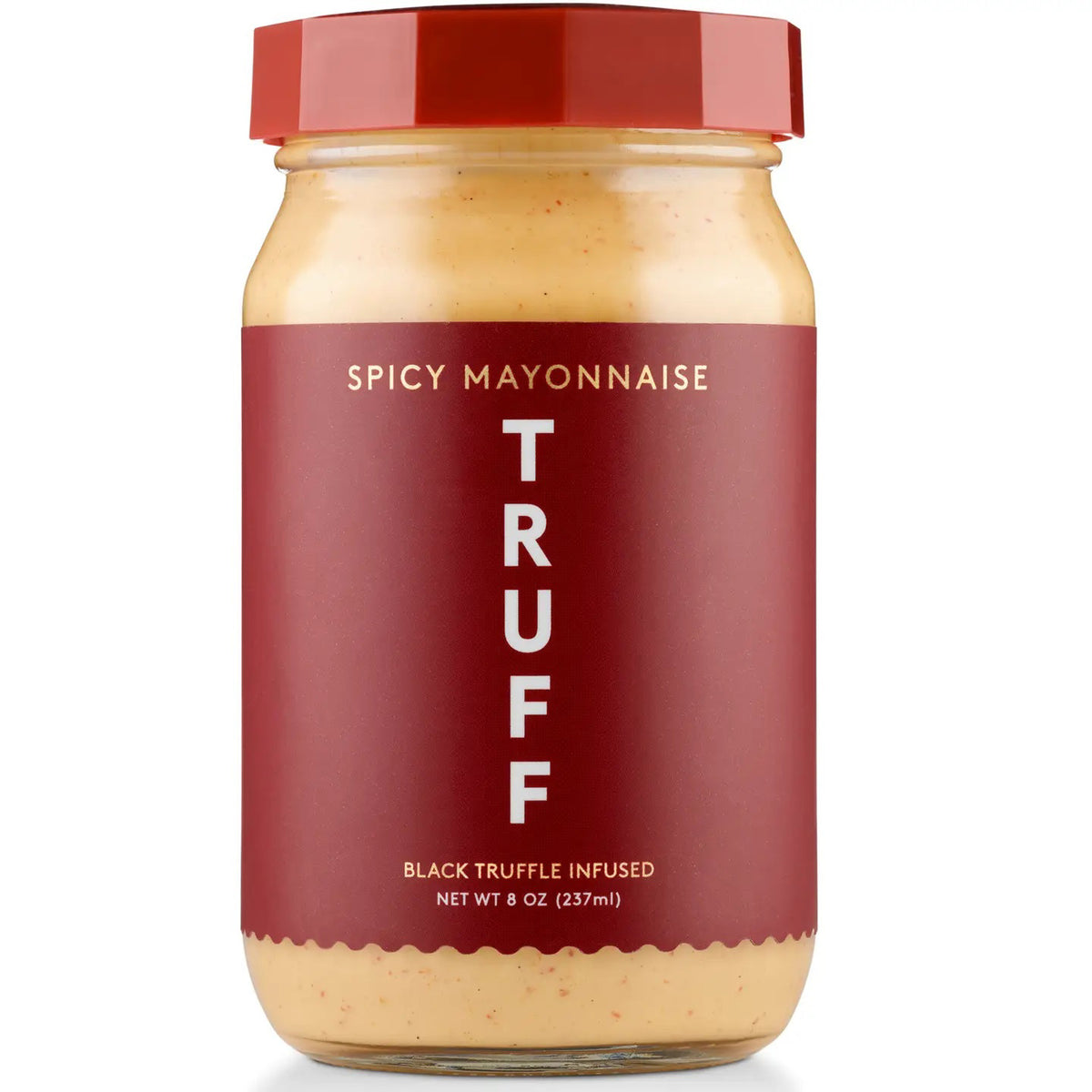 TRUFF HOT SAUCE presents TRUFF - SPICY MAYONNAISE: a creamy, spicy mayo infused with black truffle for a luxurious taste. Comes in an 8 oz jar with a red lid and bold vertical "TRUFF" branding.