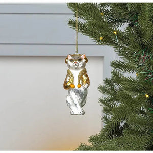 COOL MUSIC CAT ORNAMENT: a white glass cat wearing sunglasses, gold earmuffs, and a glittery gold scarf.