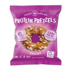 A purple bag of CRISP POWER- PROTEIN PRETZEL SESAME by CRISP POWER, a keto-friendly, plant-based snack. Each bag contains sesame-flavored pretzel rings with 6g net carbs, 27g protein, and 0g sugar. The packaging features sesame-topped rings.