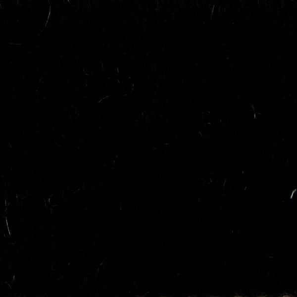 Close-up of a dark gray, fuzzy wool fabric with visible fibers and a mottled look—reflecting the refined Italian craftsmanship of SEVENTY VENEZIA FINGERLESS WOOL GLOVES by SEVENTY.