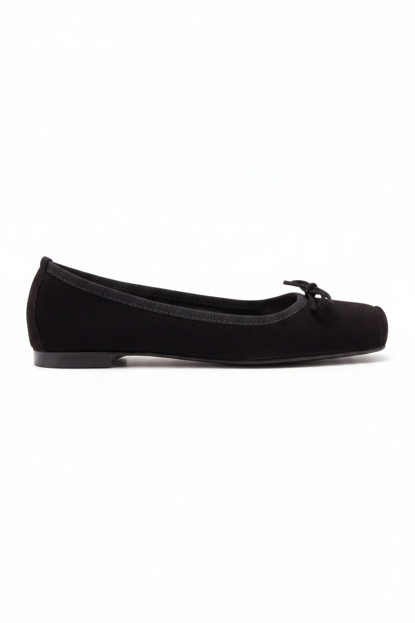 The MICHELE LOPRIORE - PALOMA BALLET FLAT WITH SQUARE TOE is a metallic silver leather shoe made in Italy, with a small bow on the rounded toe, low brown heel, and smooth texture, shown against a plain light background.