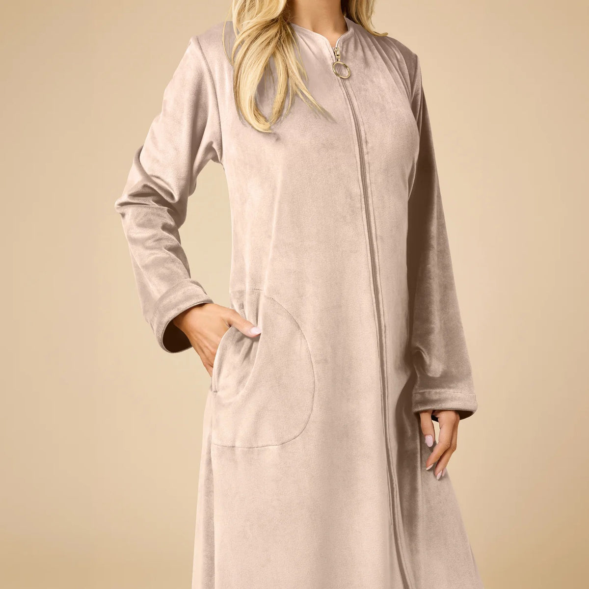 A long-sleeved, beige SOFTIES - SERENITY SHEAR MINK ZIP ROBE featuring a full-length zipper, round neckline, and two side pockets.
