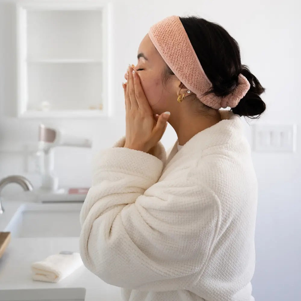 The VOLO BEAUTY - PERFECT PAIR HEADBAND AND SCRUNCHIE features a soft, cream-colored spa headband and a gentle Nanoweave scrunchie, both fluffy and textured, beautifully packaged together by VOLO BEAUTY.