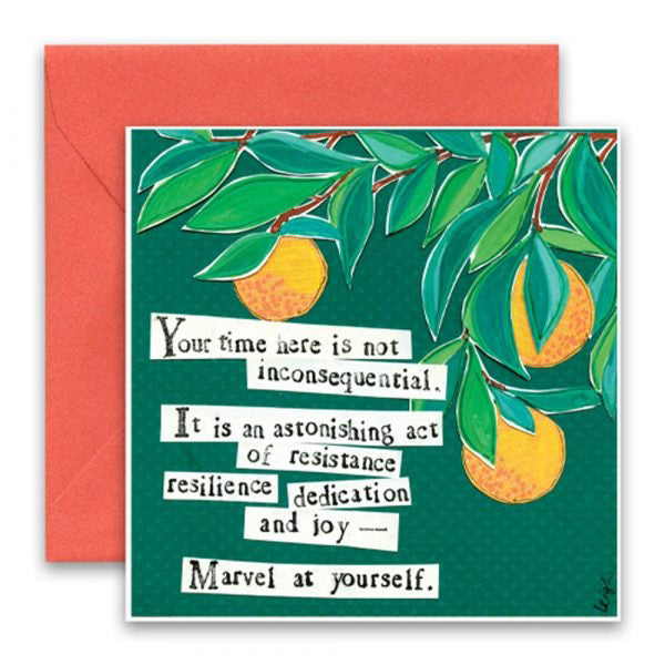 The "Curly Girl Designs - Marvel Greeting Card" by Curly Girl Design, Inc. features an illustration of orange fruits hanging from green leaves on a tree. The text on the card reads, "Your time here is not inconsequential. It is an astonishing act of resistance, resilience, dedication, and joy—Marvel at yourself." Included with the card is an orange envelope. A touch of Curly Girl's whimsical selection makes it a charming piece of collage art.