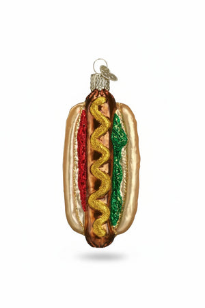 Old World Christmas HOT DOG ORNAMENT shaped like a hot dog with a yellow mustard swirl, red ketchup, and green relish.