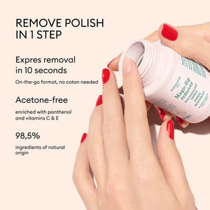 The MANUCURIST - MAGIC DIP REMOVER by MANUCURIST INC comes in a white plastic 70 mL bottle with a screw-on cap, featuring green and pink text on the label. This acetone-free, vegan nail polish remover is designed to gently remove polish and is conveniently travel-friendly for use on the go.