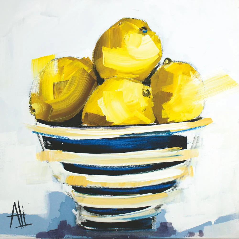 A bowl with horizontal black and white stripes holds lemons, reminiscent of a Mediterranean still life. The soft, blurred gray and white background echoes the elegance of LES CITRON BEVERAGE NAPKINS by PAPER PRODUCTS DESIGN, similar to those in packs of 20.