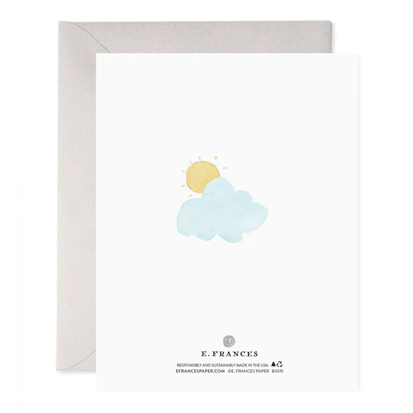 The E. FRANCES PAPER - TEACUP BABIES GREETING CARD features a watercolor painting of four teacups beneath pastel clouds, each holding a small brown object, with "Congrats on your new arrival!" text. It's elegantly paired with a gray envelope.