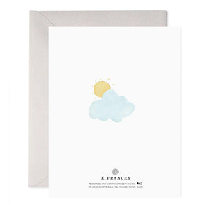 The E. FRANCES PAPER - TEACUP BABIES GREETING CARD features a watercolor painting of four teacups beneath pastel clouds, each holding a small brown object, with "Congrats on your new arrival!" text. It's elegantly paired with a gray envelope.