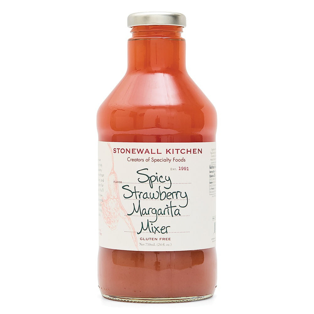 A clear glass bottle of STONEWALL KITCHEN - SPICY STRAWBERRY MARGARITA MIXER, featuring a white label and silver cap. This cocktail mix from STONEWALL KITCHEN is perfect for crafting your favorite strawberry margarita and includes product details—such as gluten-free—on the label.